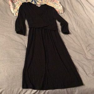 Black faux wrap dress.